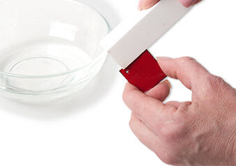 Alundum Stone being used on an enameled square